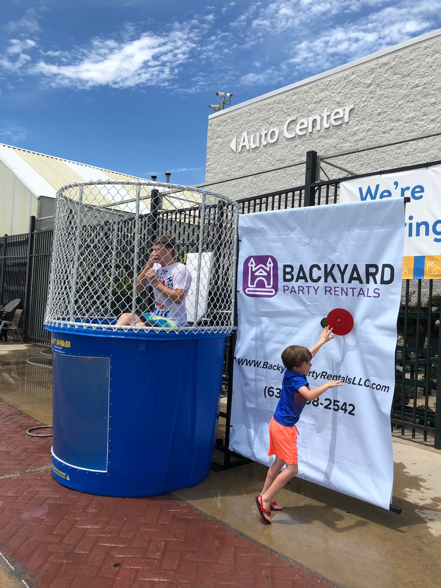 Dunk tank set up at a Backyard Party Rentals event