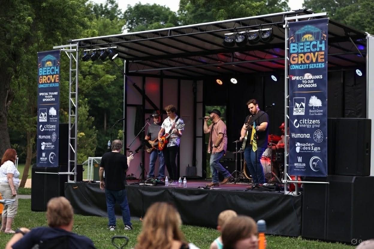 Live band performing on the Backyard Party Rentals mobile stage at an outdoor event