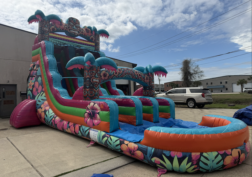 Huge dual lane waterslide for rent in Metairie with Hawaiian vibe