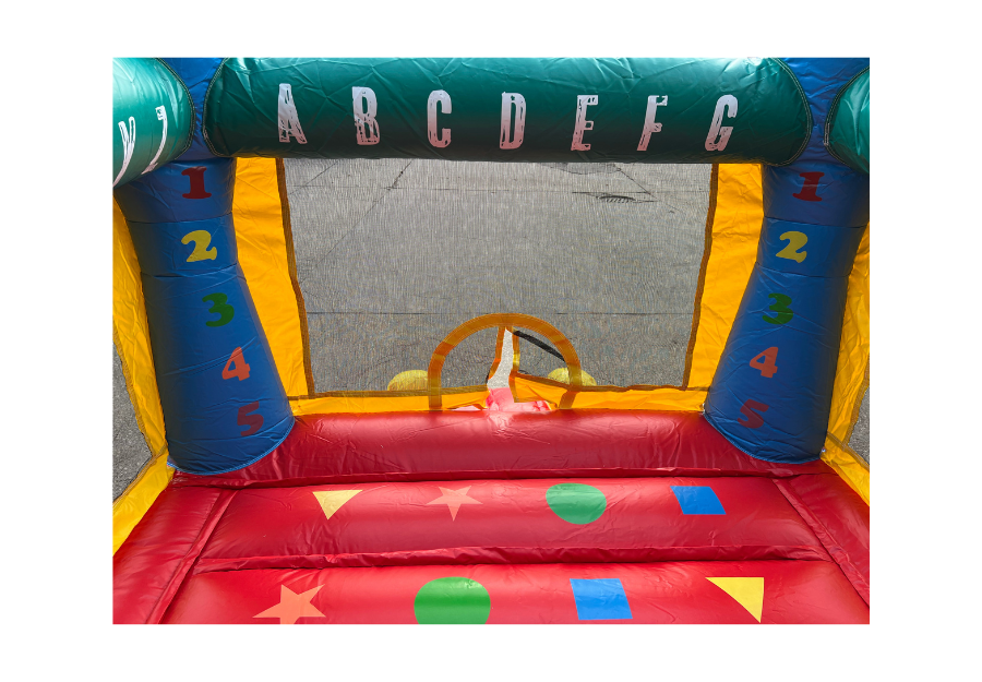 Kids playing inside a commercial bounce house rental