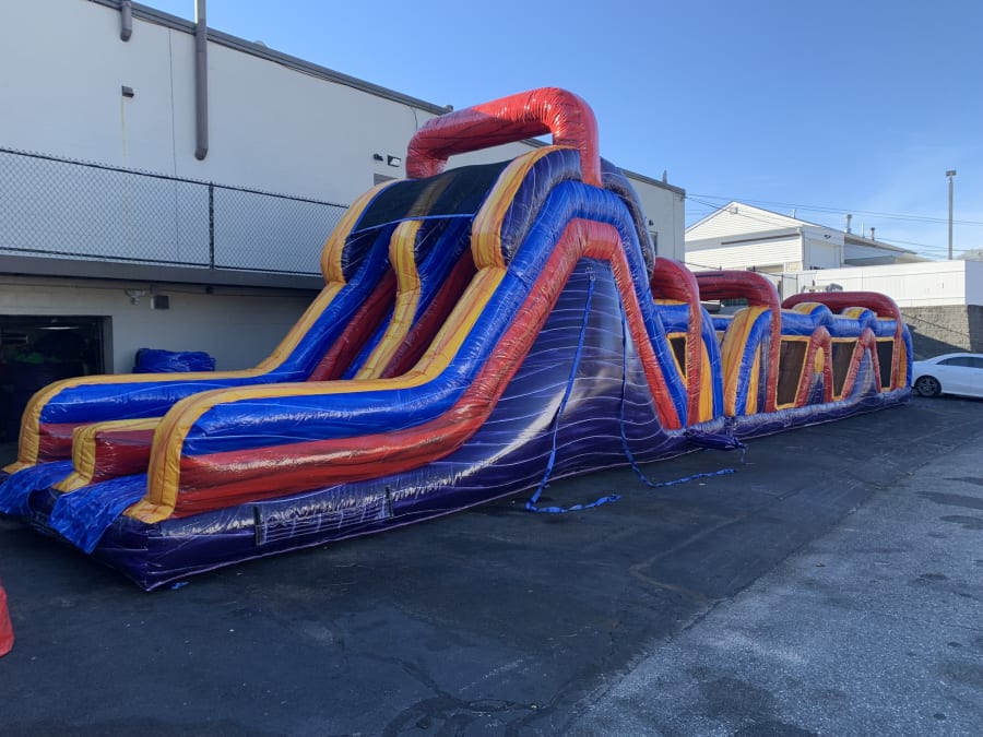 75ft Warped Wall Marble Mania Obstacle Course Rental